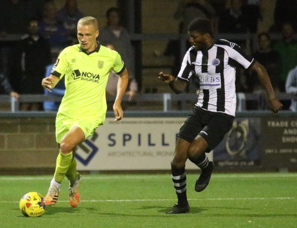 Weymouth and AFC Bournemouth Defender Brennan Camp playing against Dorchester Town