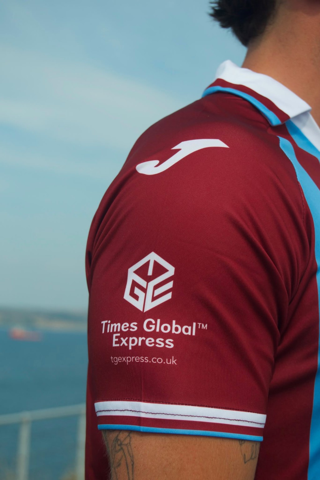 Sleeve sponsor detail on the new Weymouth FC shirt