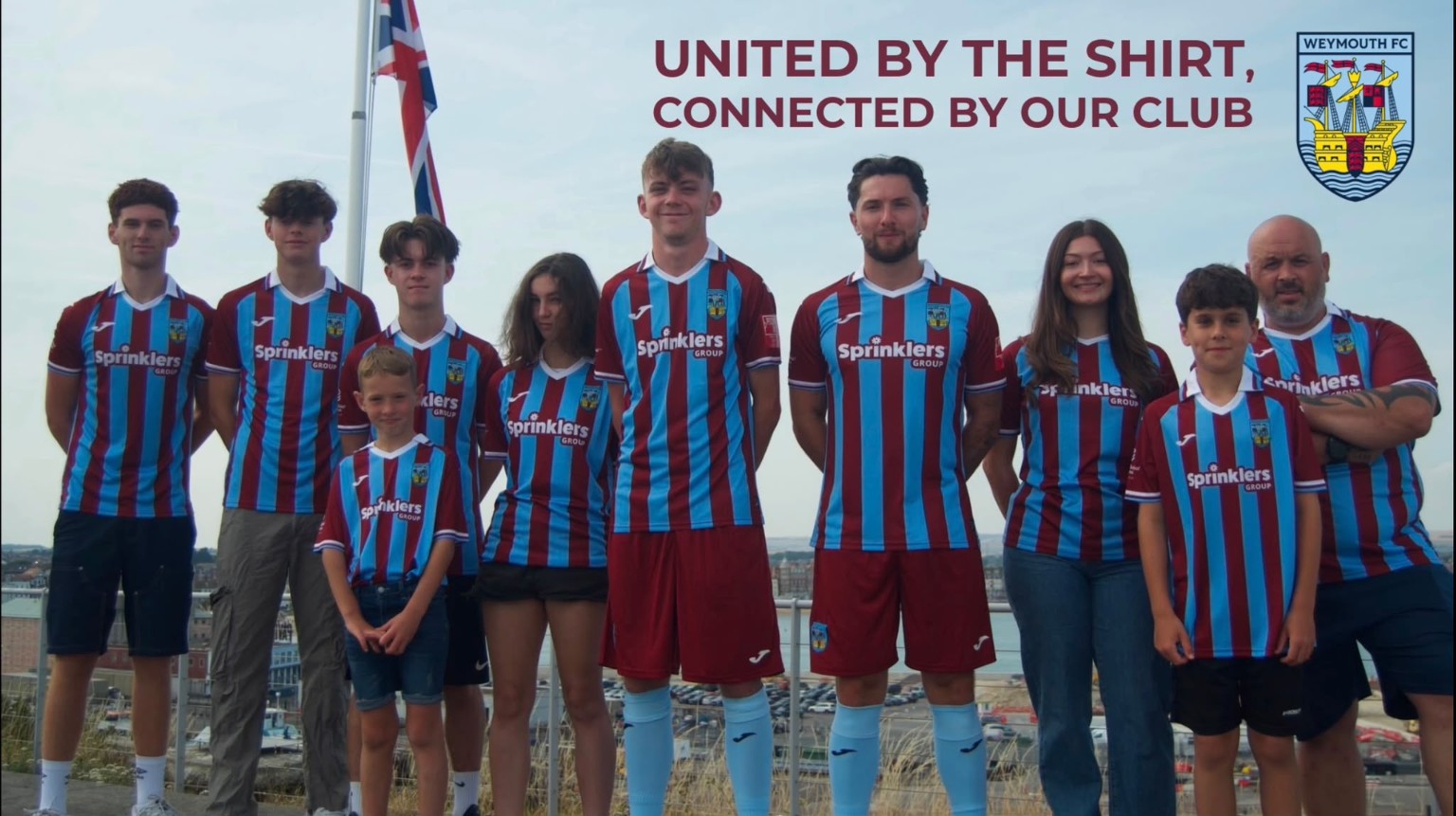 Players and supporters wearing the new Weymouth FC home shirt